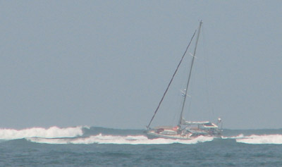 Lotus aground in the surf Bahia del Sol, El Salvador