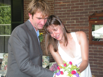 Jeff and Sarah cutting the cake