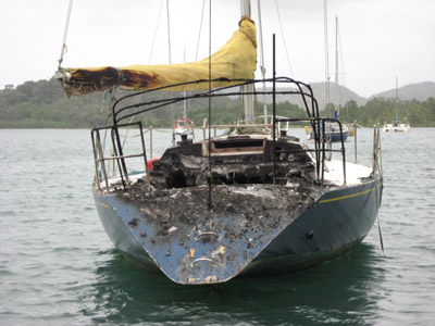 totally burned boat. Portobelo, Panama