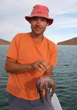 Joshua holding an octopus
