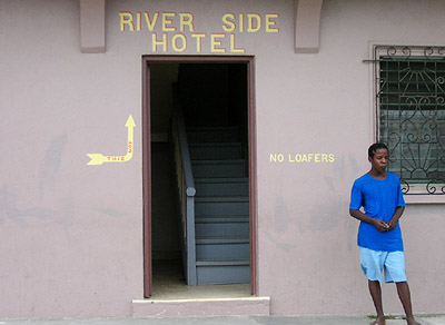 Hand Painted Sign. River Side Hotel No Loafers. Dangriga Town, Belize