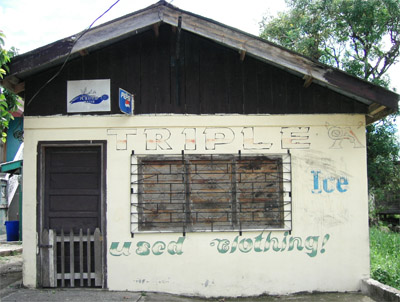 Hand painted sign. Triple used clothing. Punta Gorda, Belize