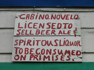 Hand Painted Sign. Licensed to sell beer ale & spiritous liquors. Dangriga Town, Belize