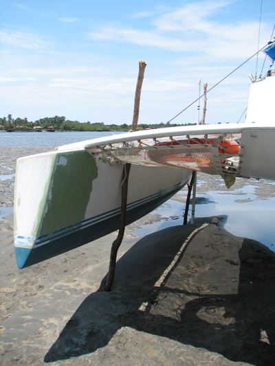 Searunner 31 haul out on tidal flats, El Salvador