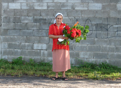 woman with flowers. El Salvador